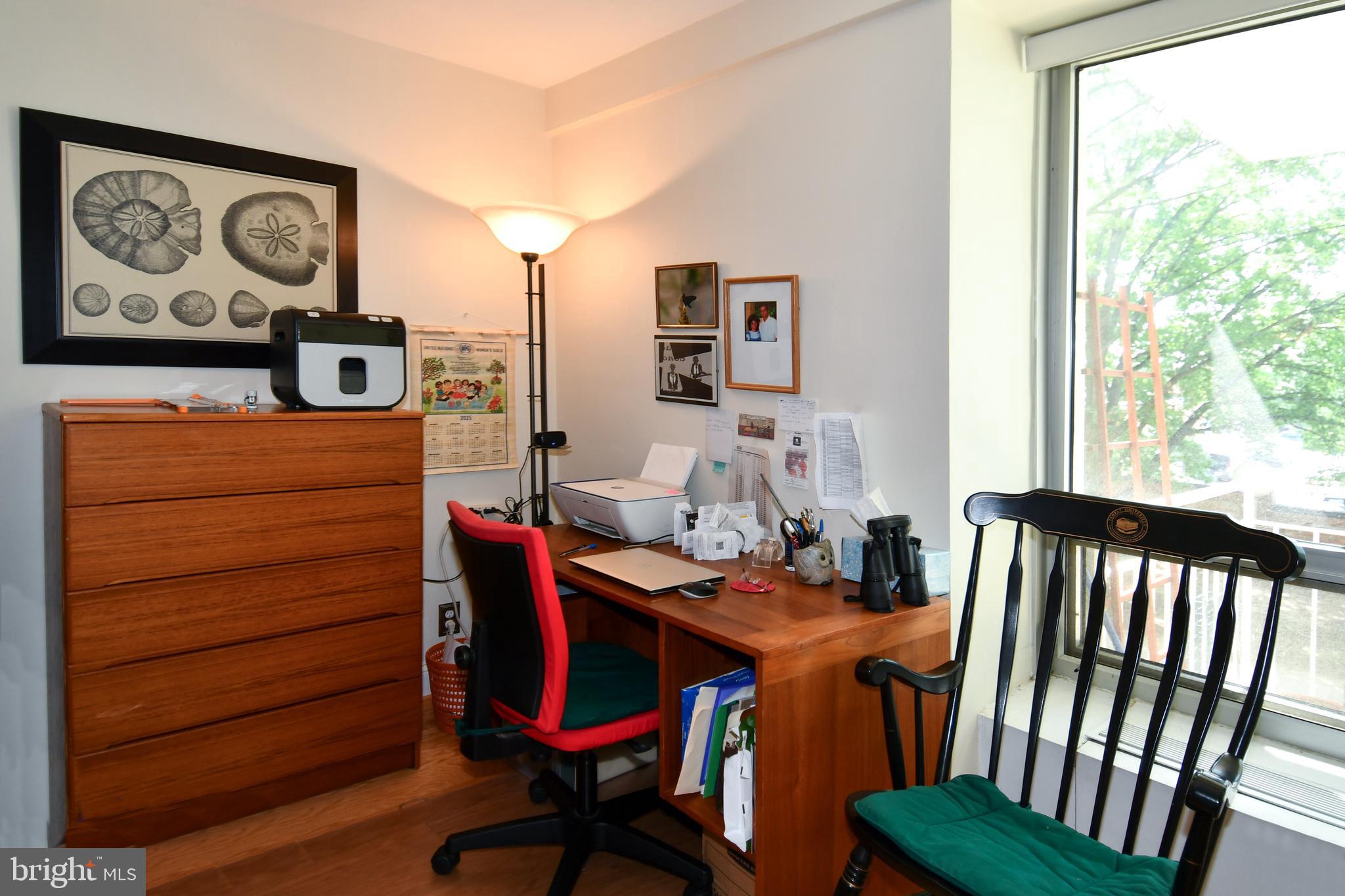 1435 4th Street Southwest, Unit B108 Washington, DC 20024 - Photo 25 of 57 a view of a dining room with furniture window and wooden floor