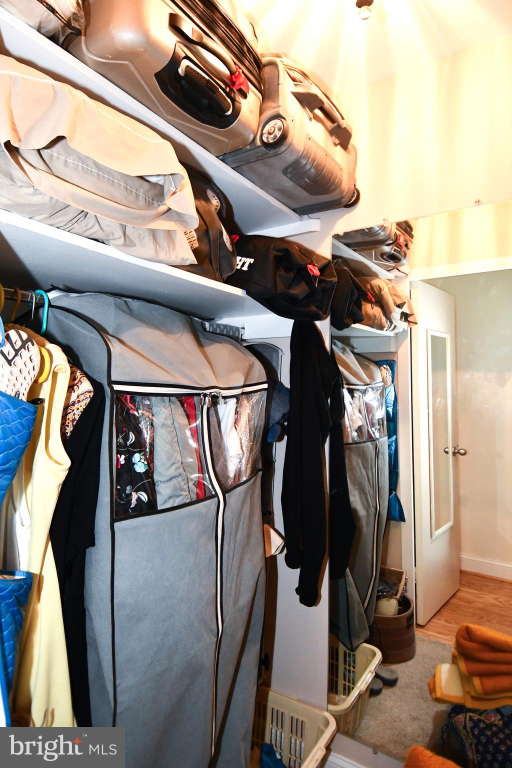 1435 4th Street Southwest, Unit B108 Washington, DC 20024 - Photo 26 of 57 a view of walk in closet with clothes and shoes