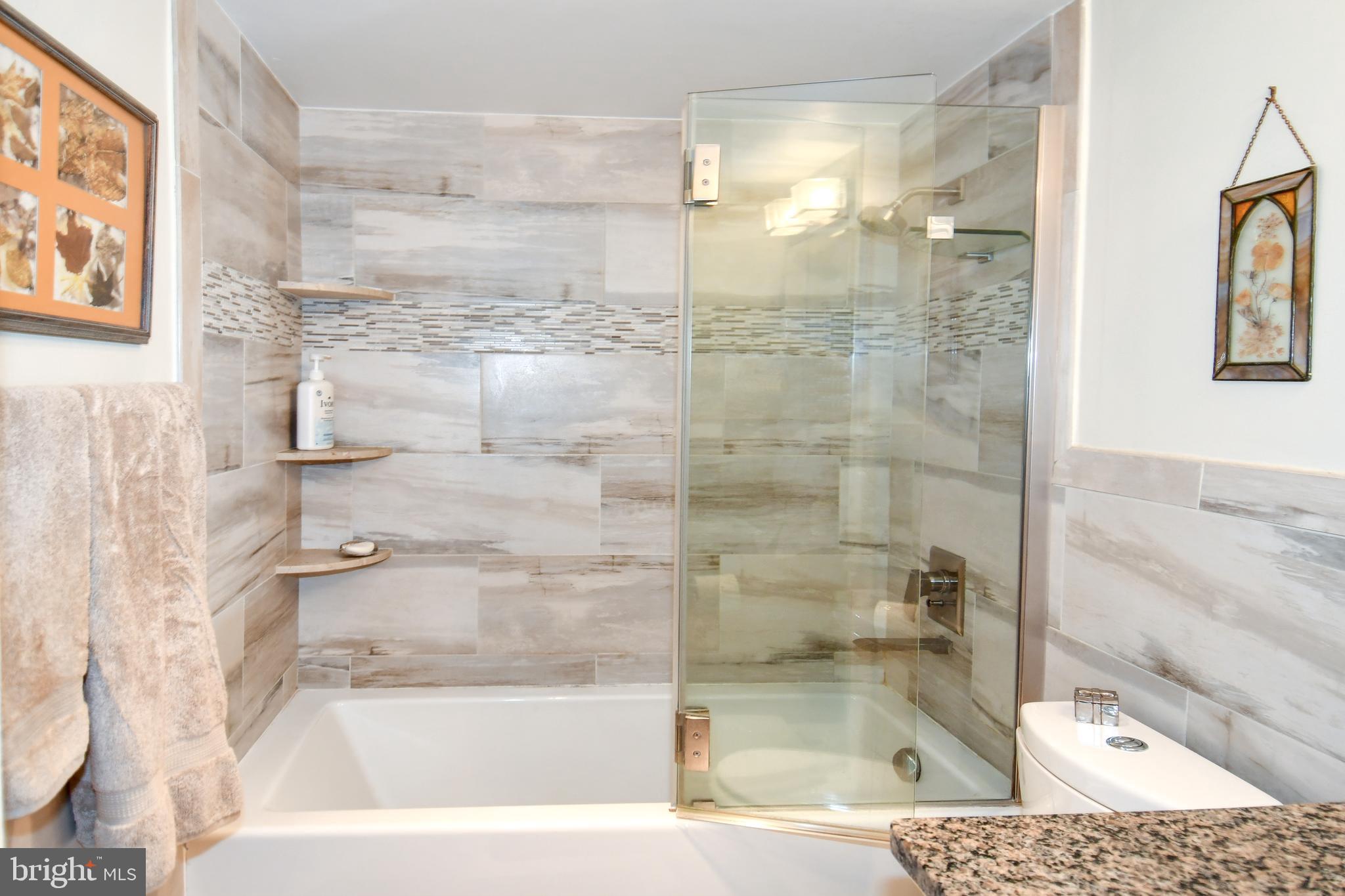 1435 4th Street Southwest, Unit B108 Washington, DC 20024 - Photo 29 of 57 a bathroom with a bathtub and a shower