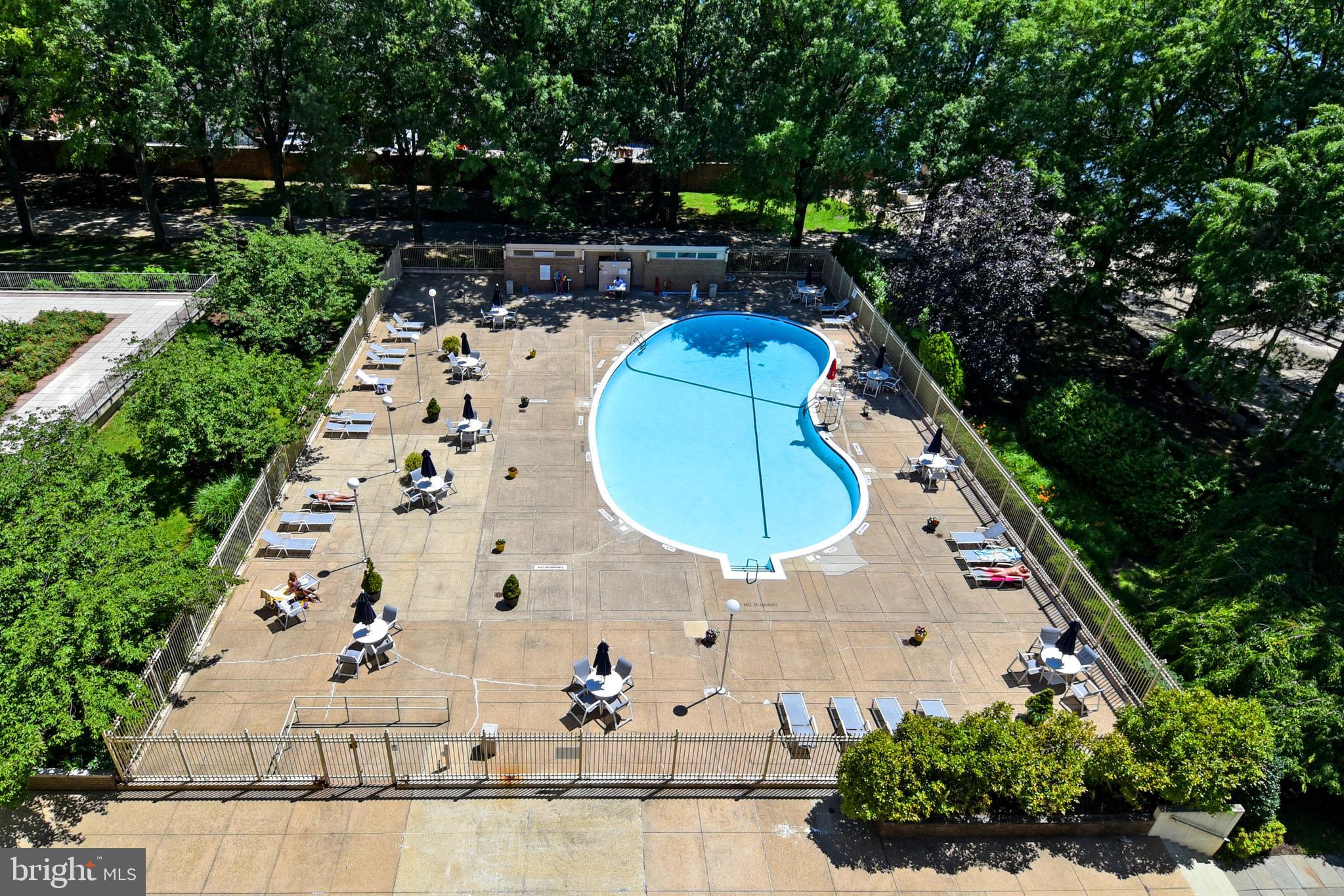 1435 4th Street Southwest, Unit B108 Washington, DC 20024 - Photo 33 of 57 a view of a swimming pool with a yard