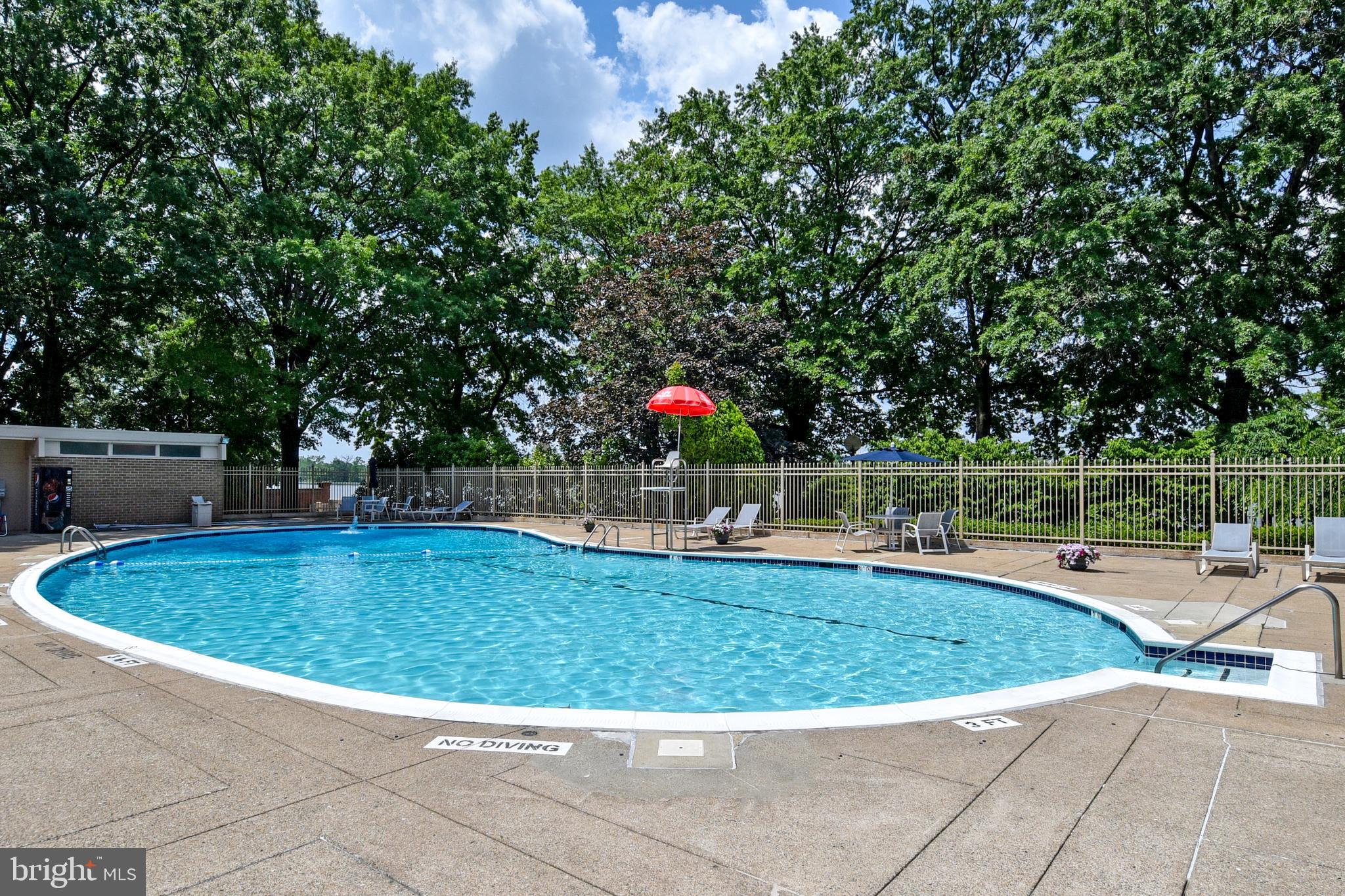 1435 4th Street Southwest, Unit B108 Washington, DC 20024 - Photo 34 of 57 a view of a swimming pool with a seating space