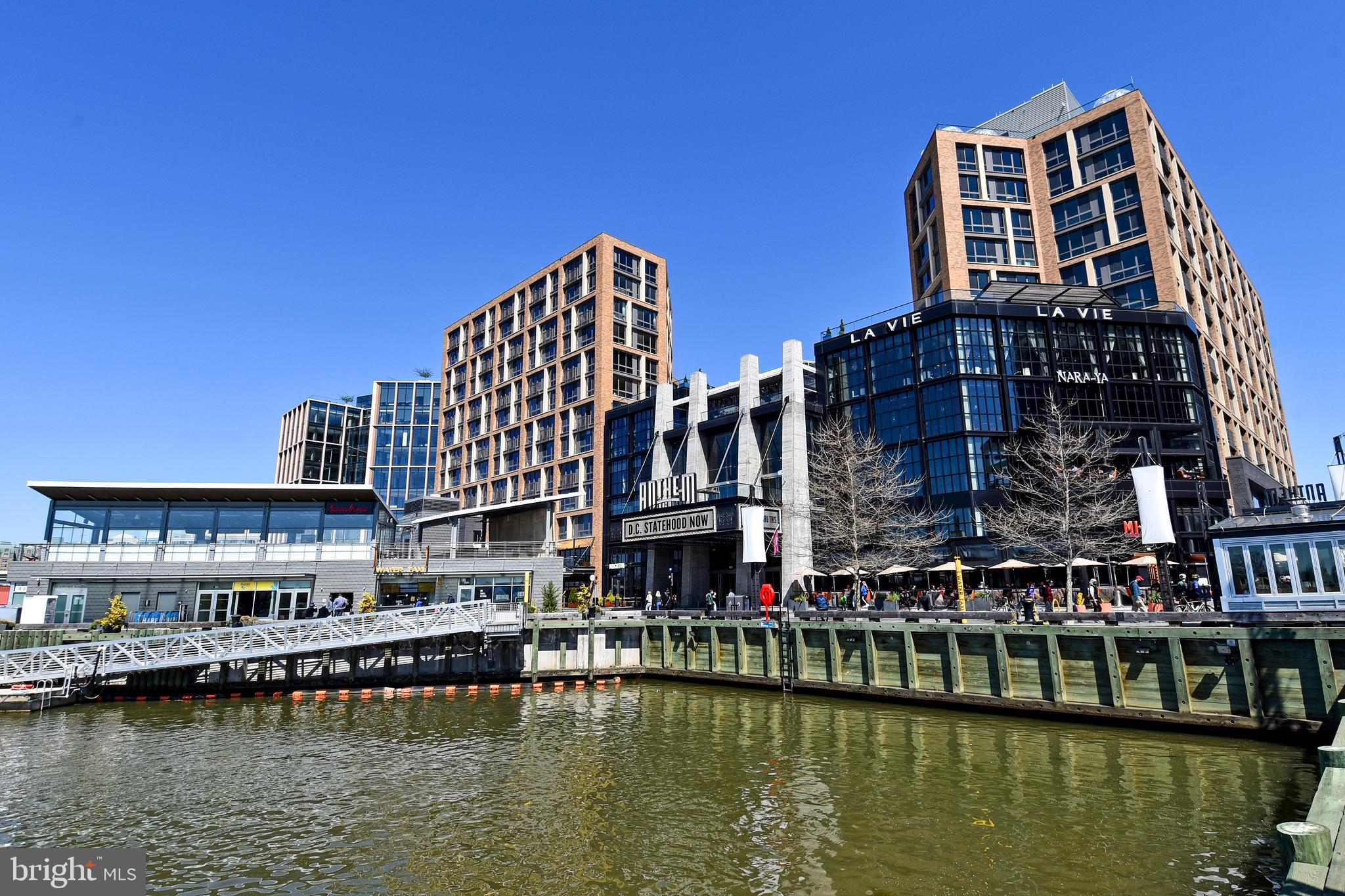 1435 4th Street Southwest, Unit B108 Washington, DC 20024 - Photo 55 of 57 a view of a large building with a lake view