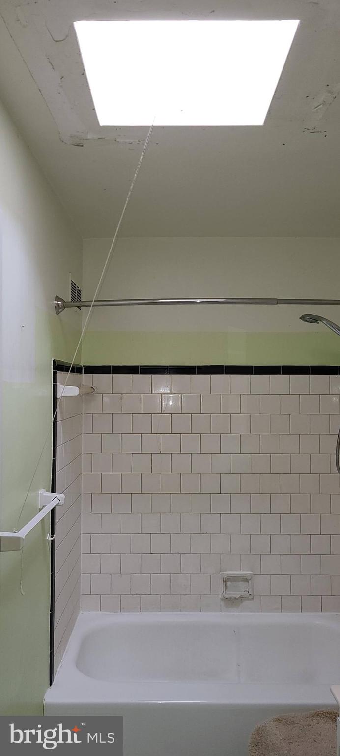 8317 Hillendale Road Baltimore, MD 21234 - Photo 22 of 36 Second floor full bath with sky light