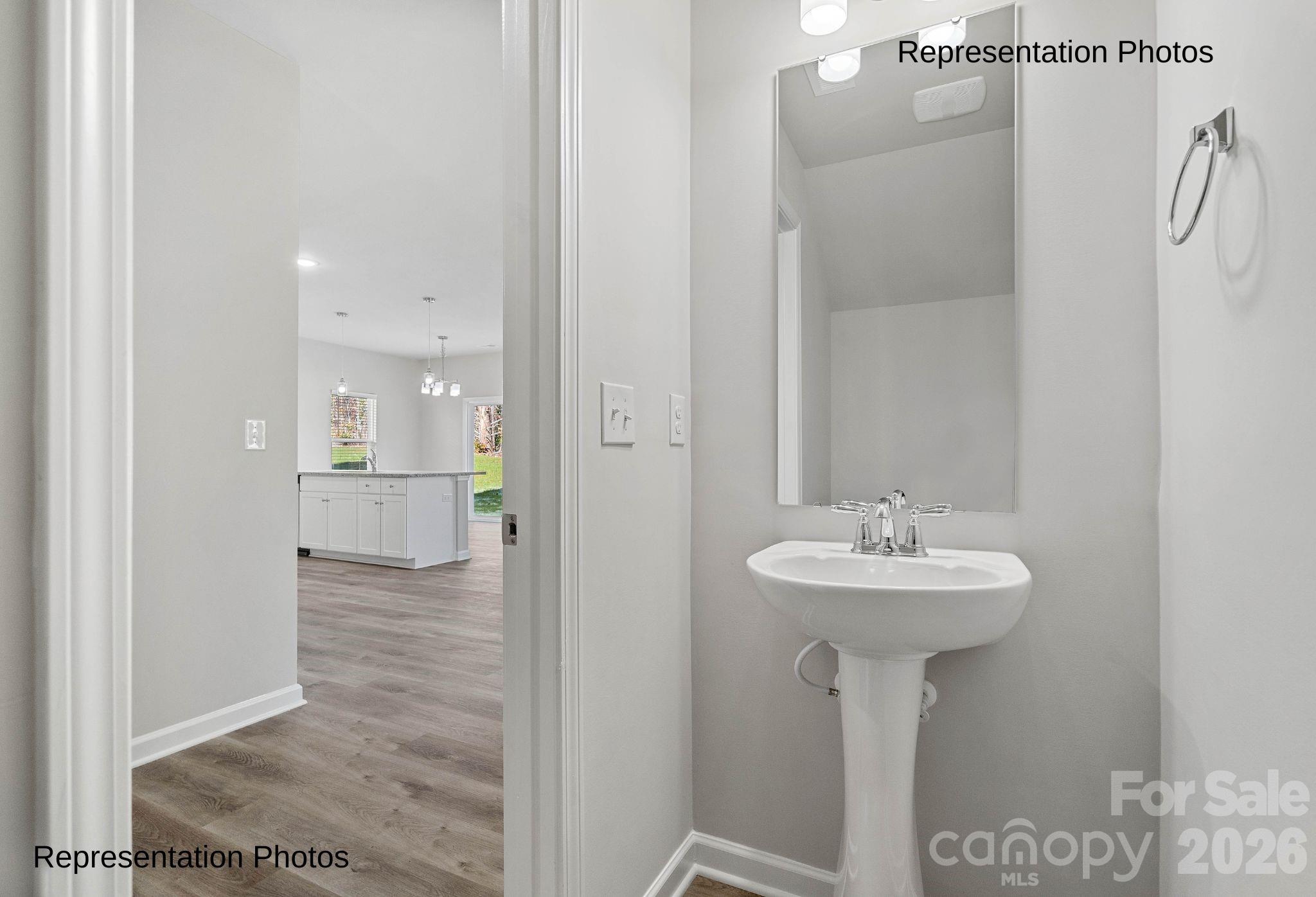 111 Pinnacle Crossing Shelby, NC 28152 - Photo 11 of 24 a bathroom with a sink a mirror and shower