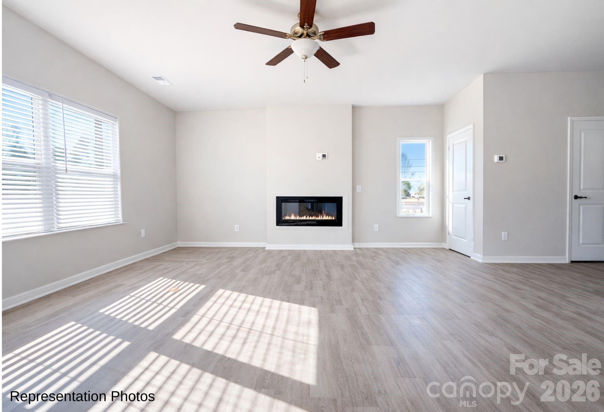 111 Pinnacle Crossing Shelby, NC 28152 - Photo 6 of 24 a view of empty room with wooden floor and fan