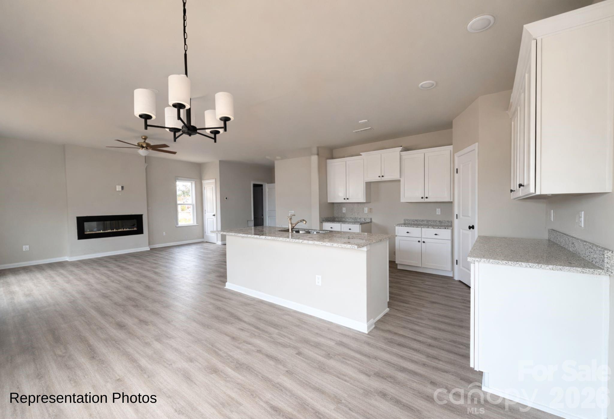 111 Pinnacle Crossing Shelby, NC 28152 - Photo 8 of 24 a view of a kitchen with a sink stainless steel appliances and cabinets
