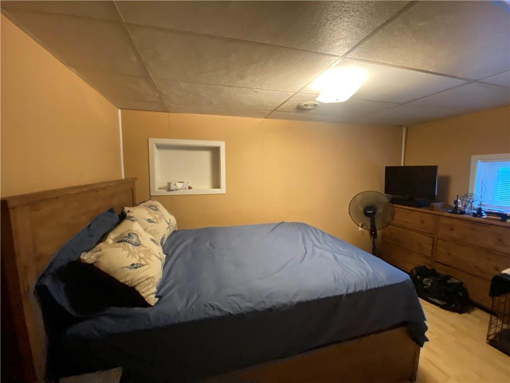 553 Browntown Road New Stanton, PA 15672 - Photo 13 of 20 a bedroom with a bed and tv