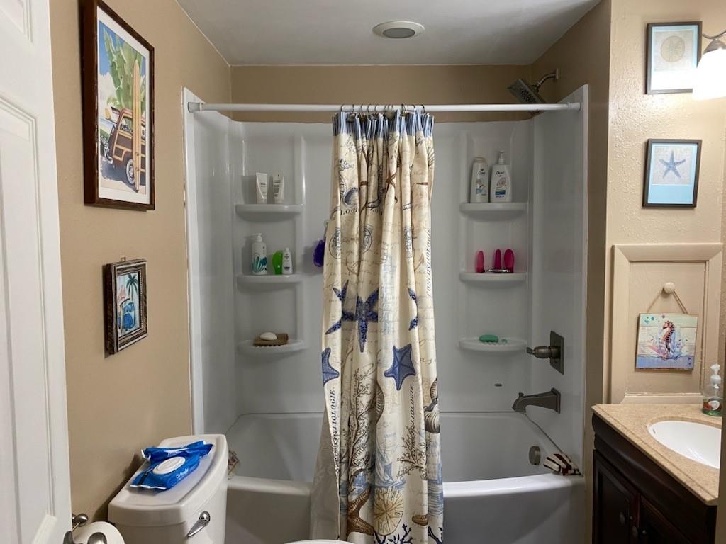 553 Browntown Road New Stanton, PA 15672 - Photo 15 of 20 a bathroom with a bathtub a sink and a shower