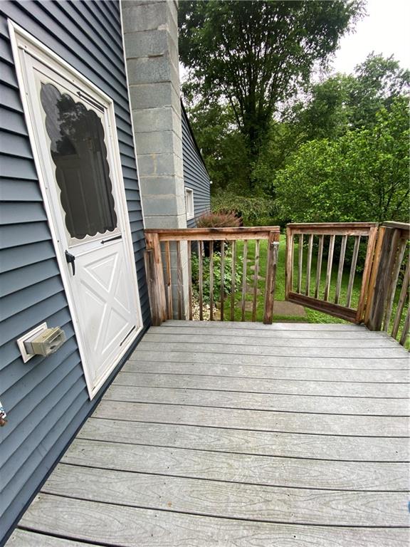 553 Browntown Road New Stanton, PA 15672 - Photo 19 of 20 a balcony with wooden floor