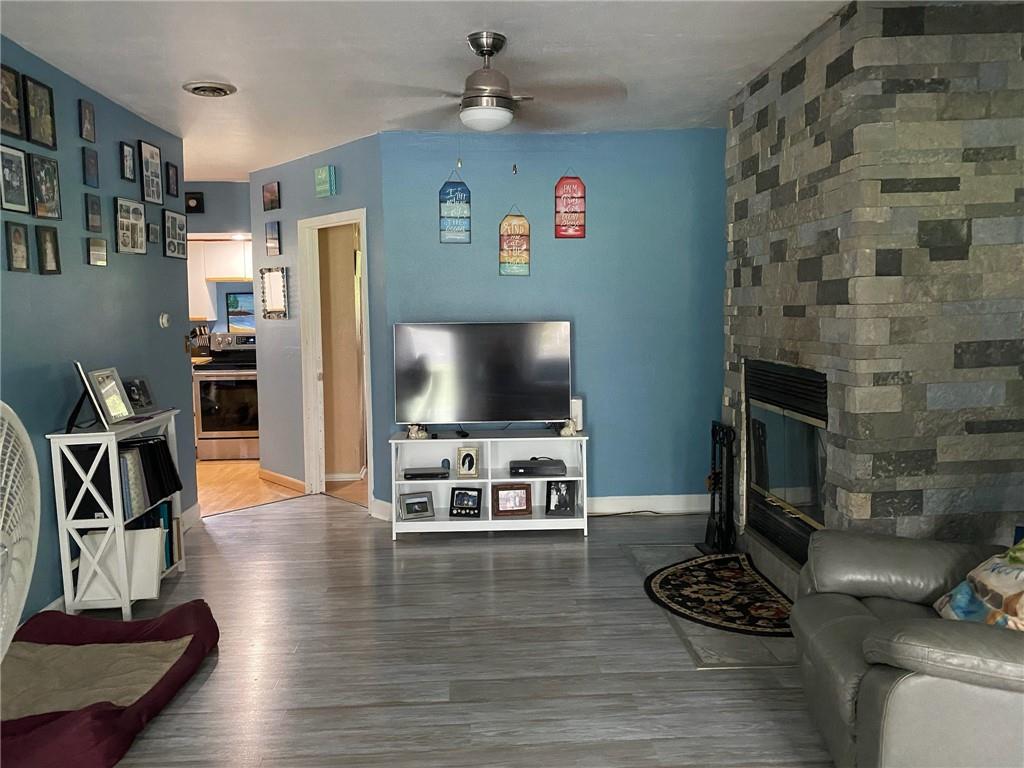 553 Browntown Road New Stanton, PA 15672 - Photo 3 of 20 a living room with furniture and a flat screen tv