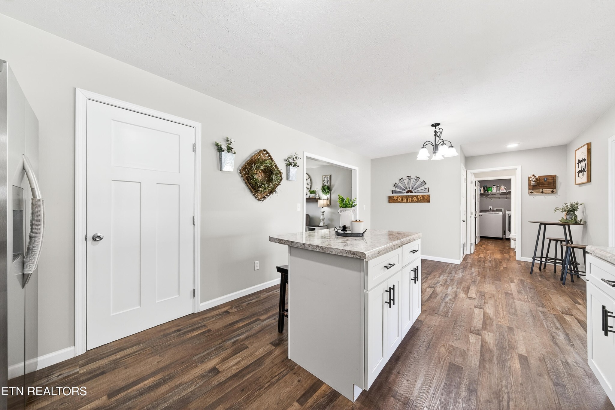 225 Peach Street Baxter, TN 38544 - Photo 11 of 35 a kitchen with a sink and wooden floor
