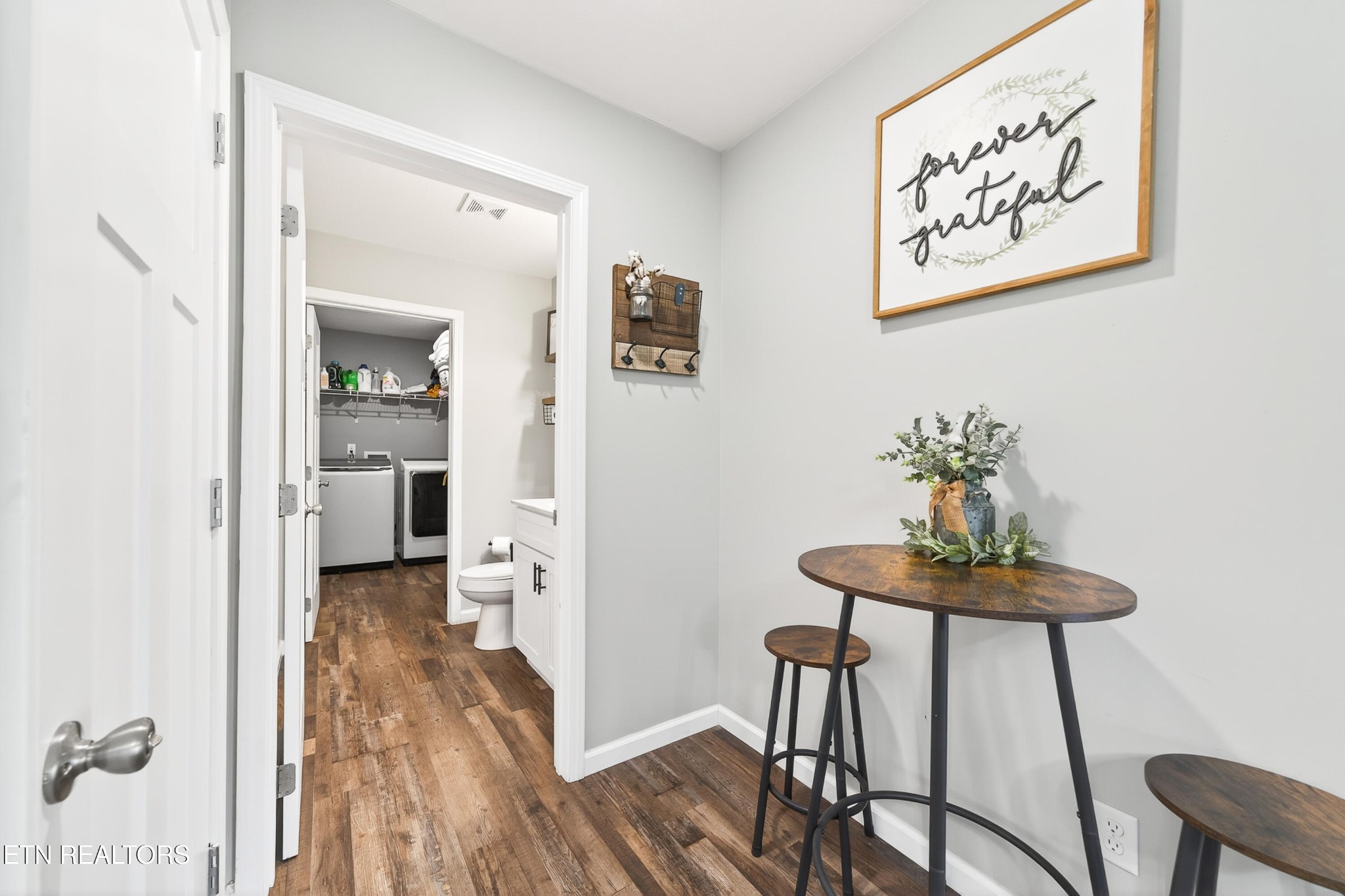 225 Peach Street Baxter, TN 38544 - Photo 13 of 35 a view of a hallway with furniture and wooden floor