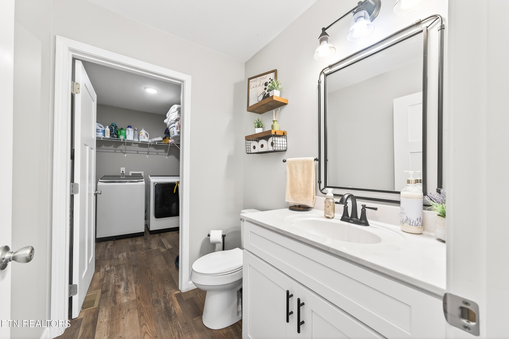 225 Peach Street Baxter, TN 38544 - Photo 14 of 35 a bathroom with a sink a toilet and shower