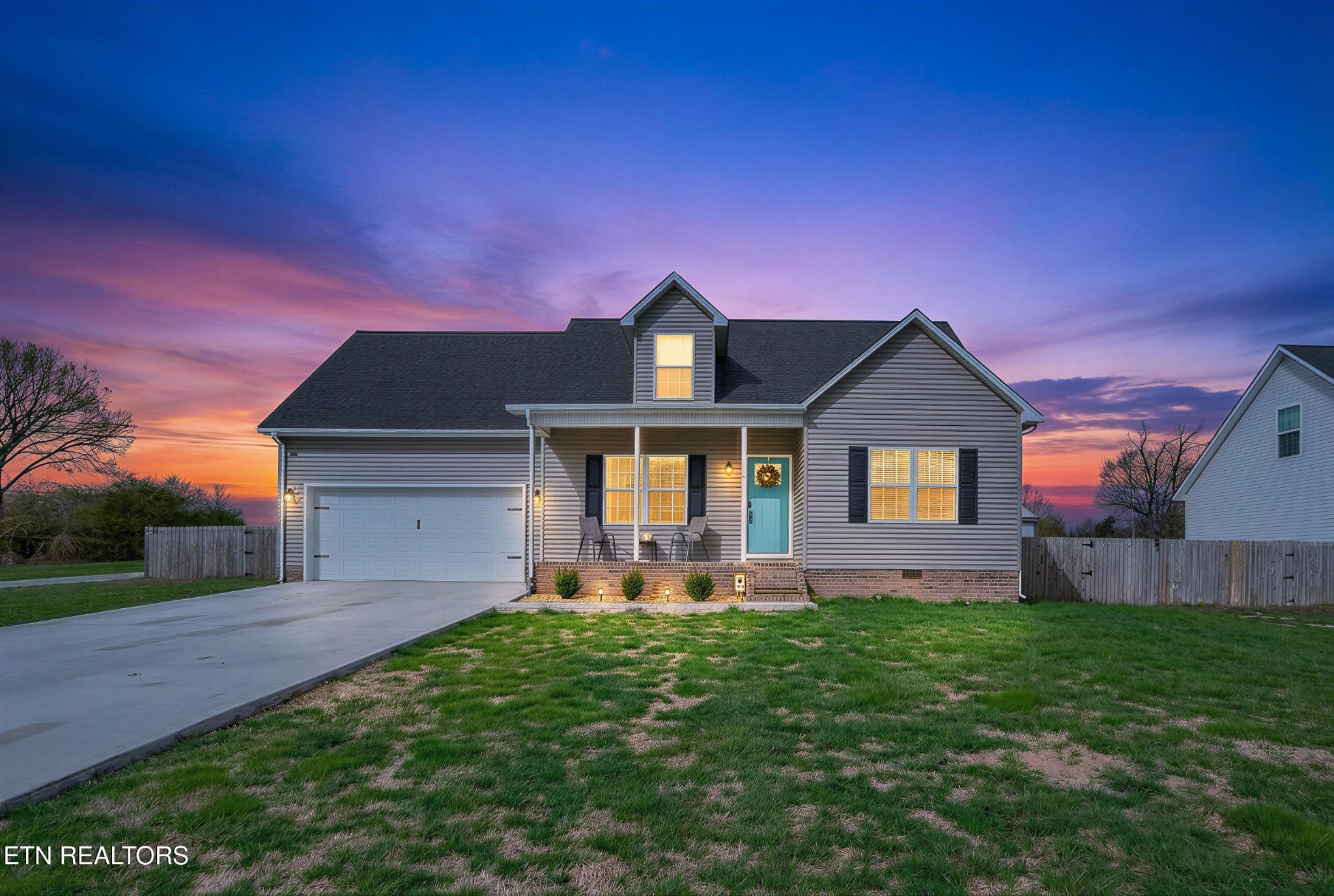 225 Peach Street Baxter, TN 38544 - Photo 2 of 35 a front view of a house with a yard