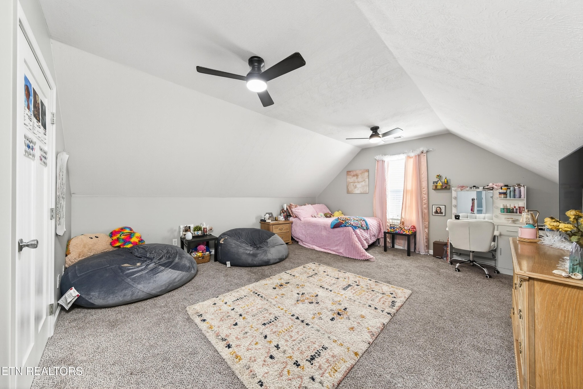 225 Peach Street Baxter, TN 38544 - Photo 24 of 35 a bedroom with furniture a bed and a window