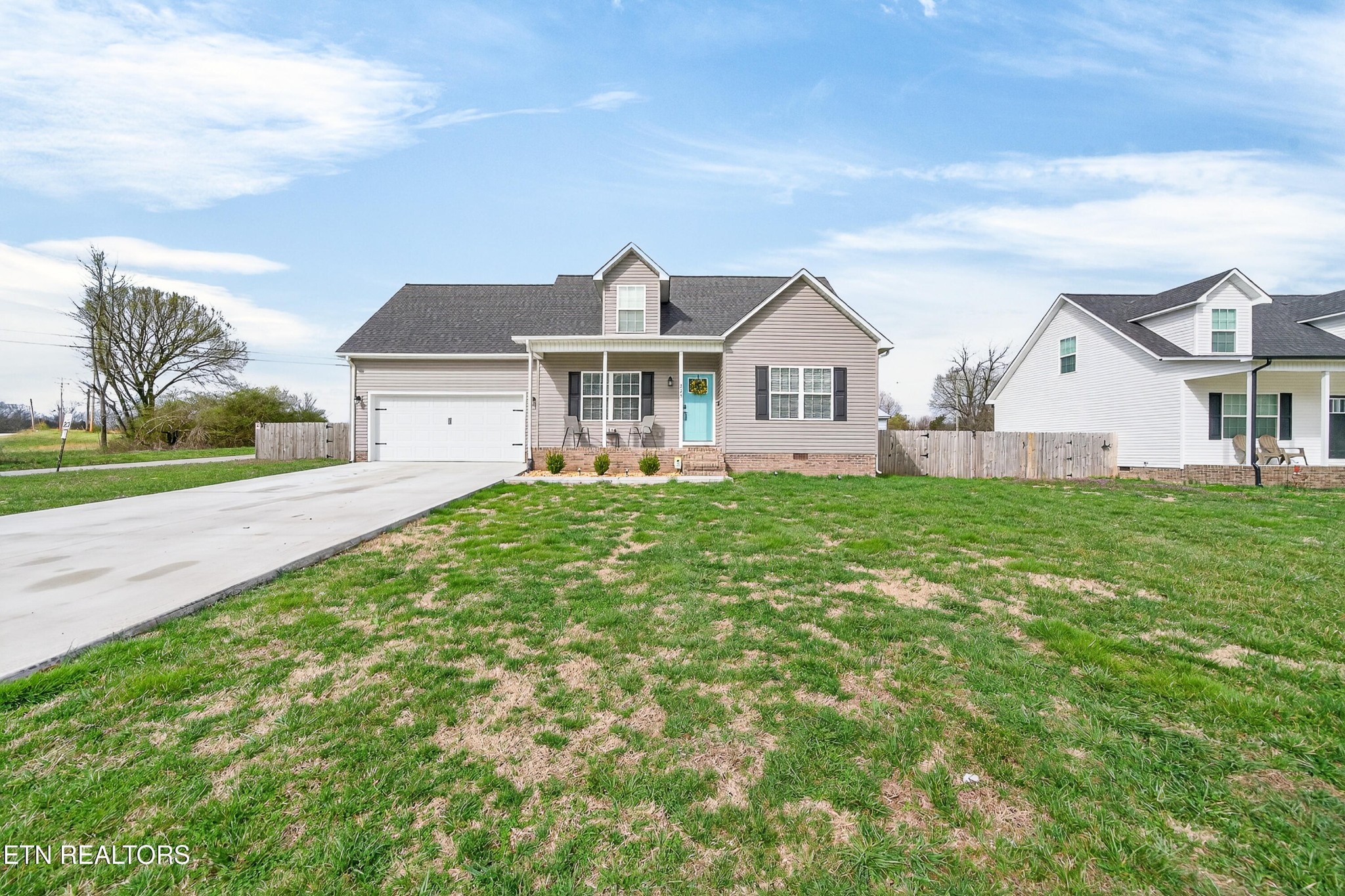 225 Peach Street Baxter, TN 38544 - Photo 26 of 35 front view of a house with a yard
