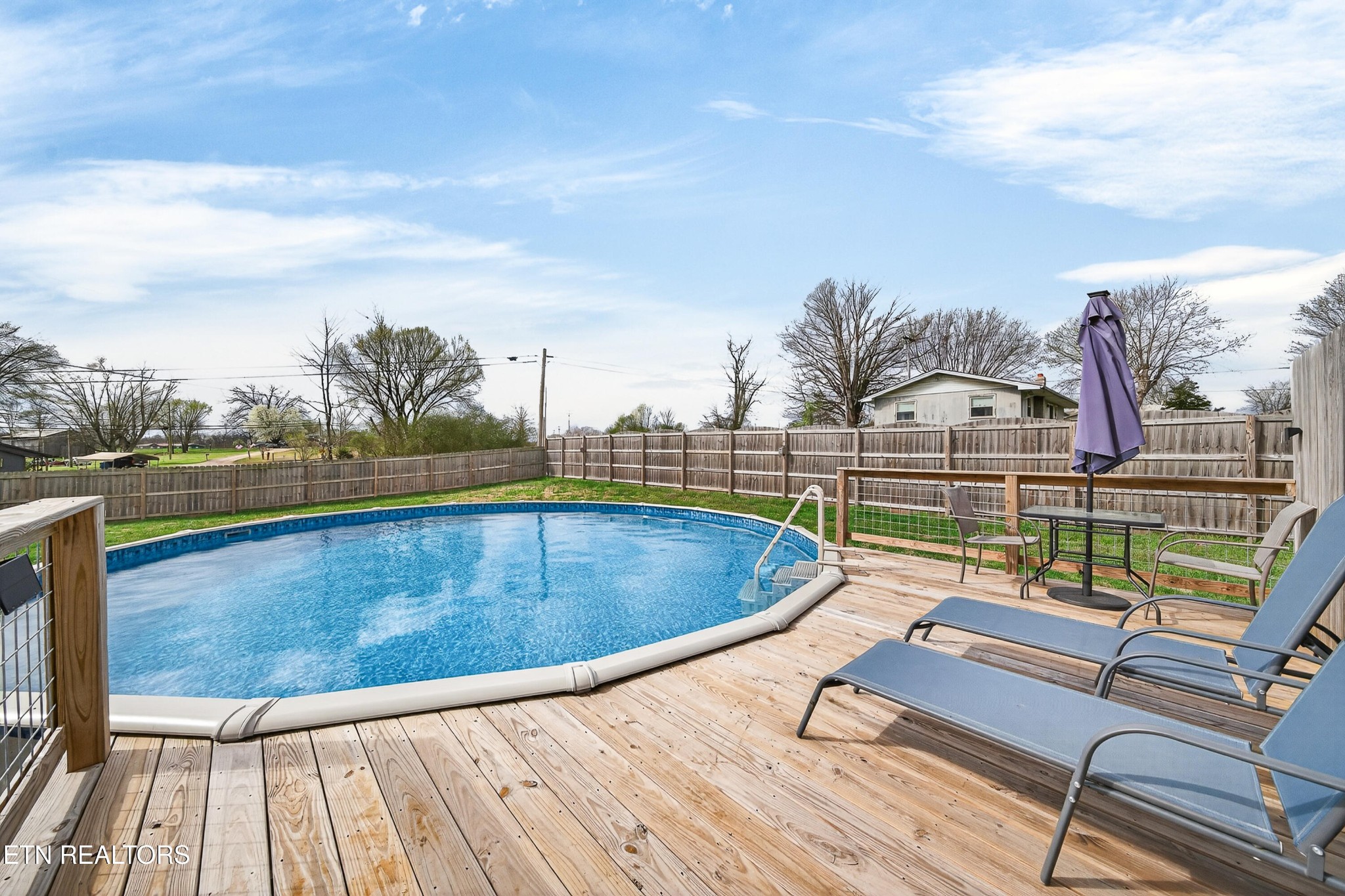 225 Peach Street Baxter, TN 38544 - Photo 3 of 35 a view of swimming pool with seating space