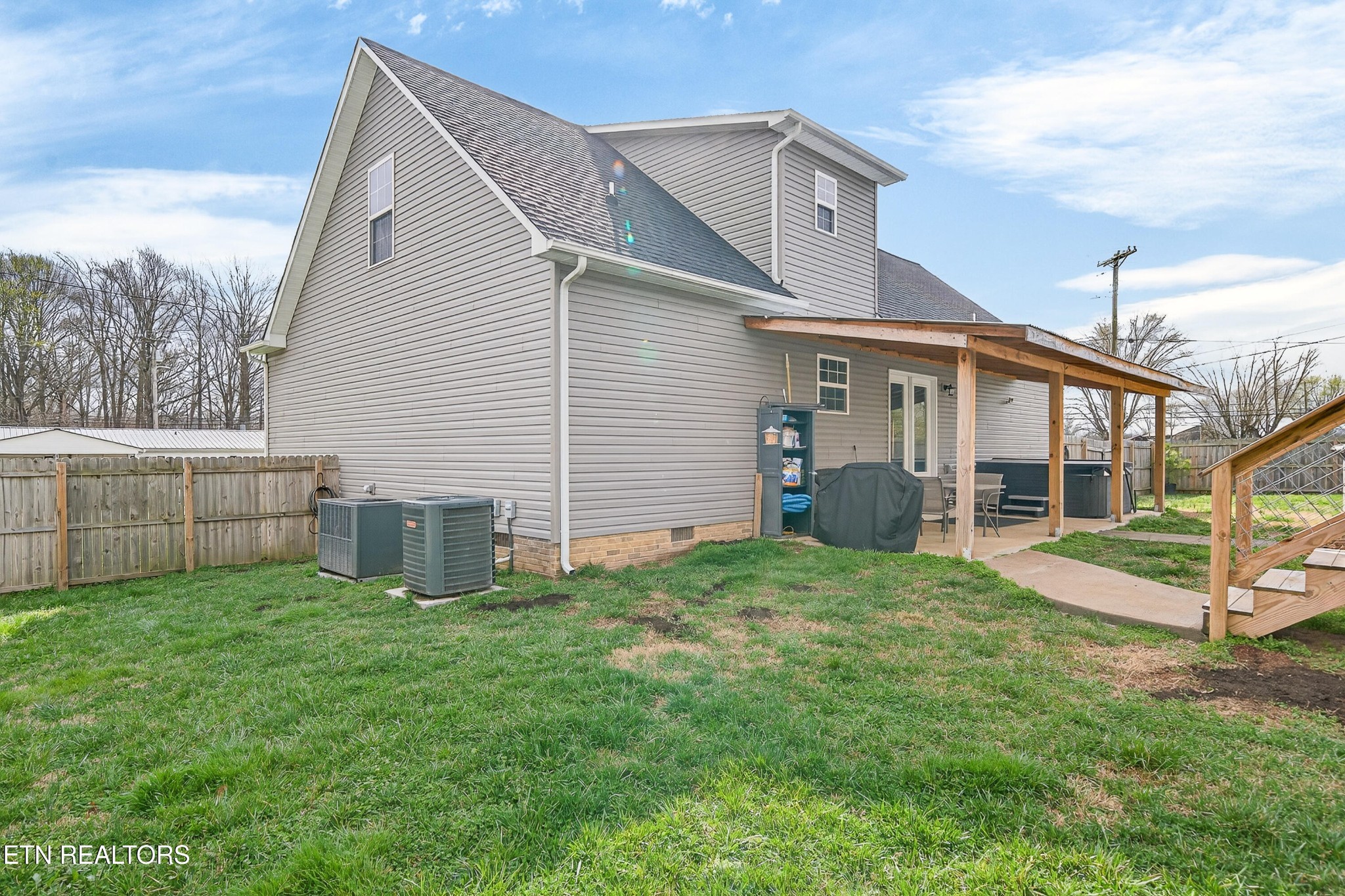 225 Peach Street Baxter, TN 38544 - Photo 31 of 35 a view of a house with backyard