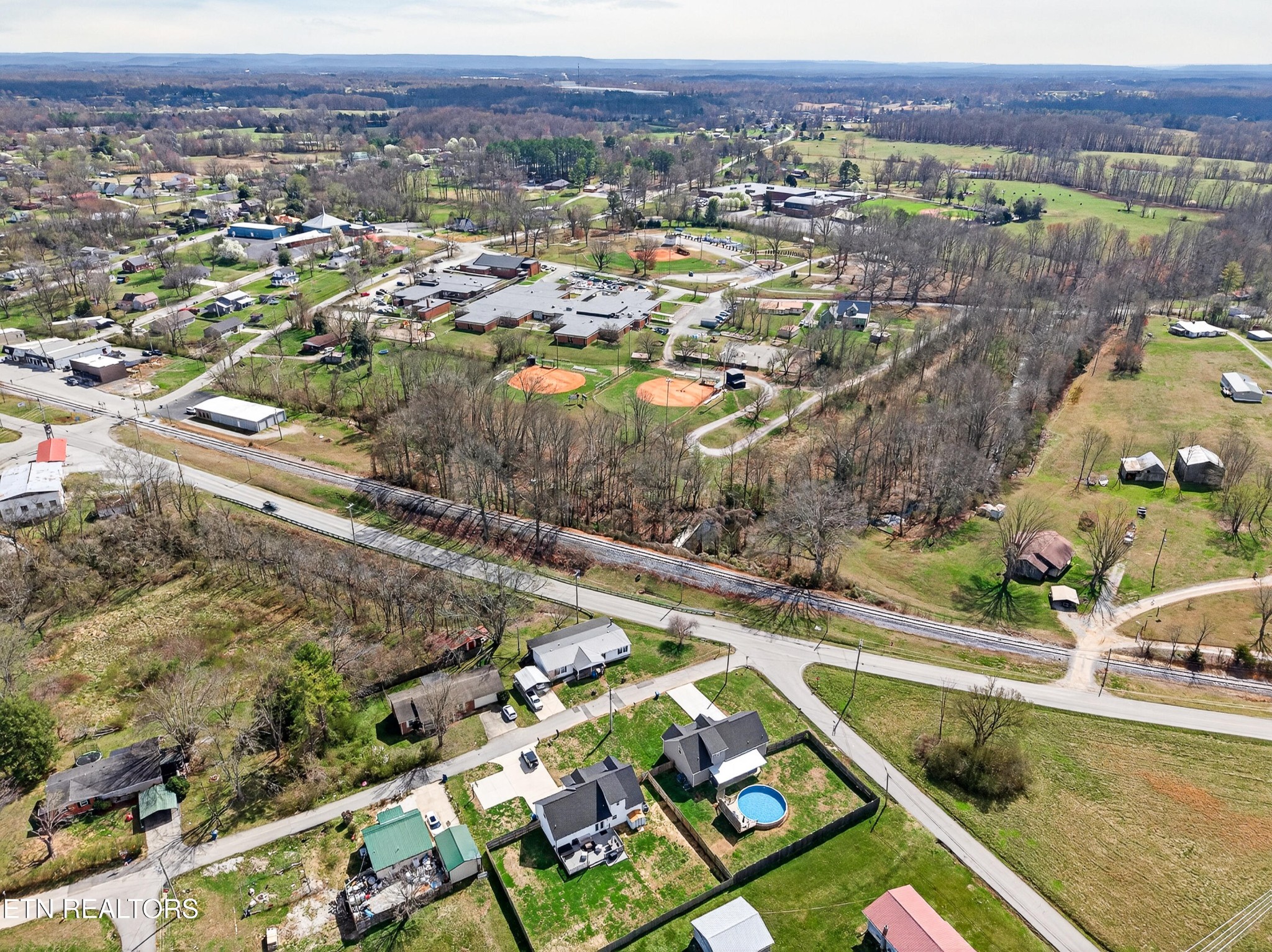 225 Peach Street Baxter, TN 38544 - Photo 35 of 35 an aerial view of residential houses with outdoor space