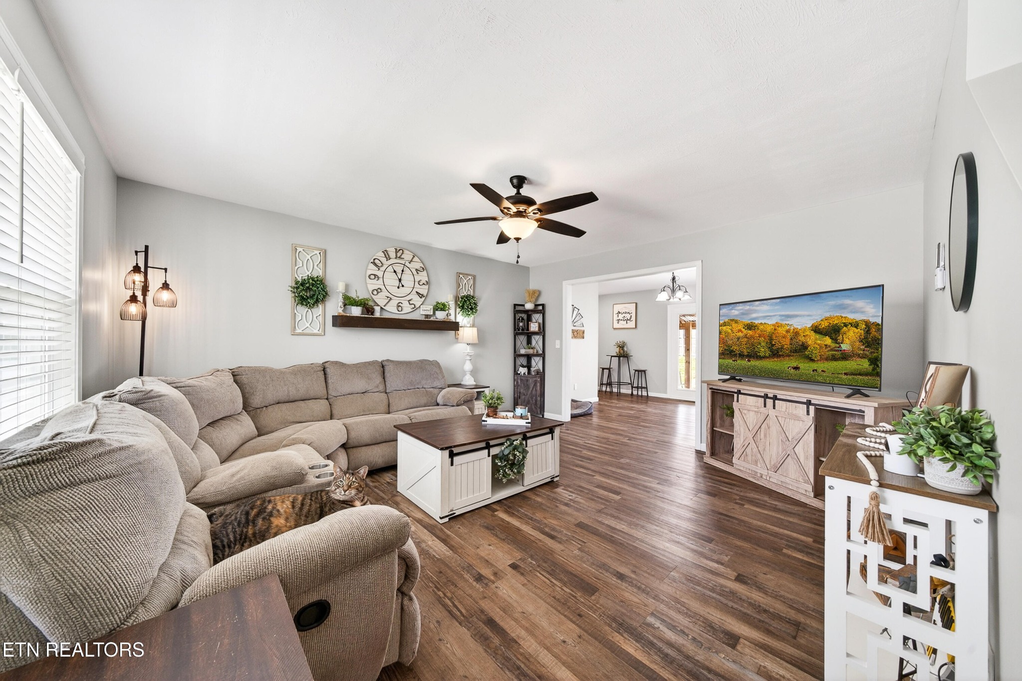 225 Peach Street Baxter, TN 38544 - Photo 5 of 35 a living room with furniture and wooden floor