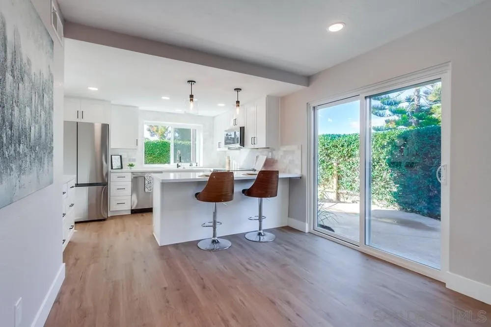 1278 Avenida Miguel Encinitas, CA 92024 - Photo 17 of 47 a living room with furniture and a wooden floor