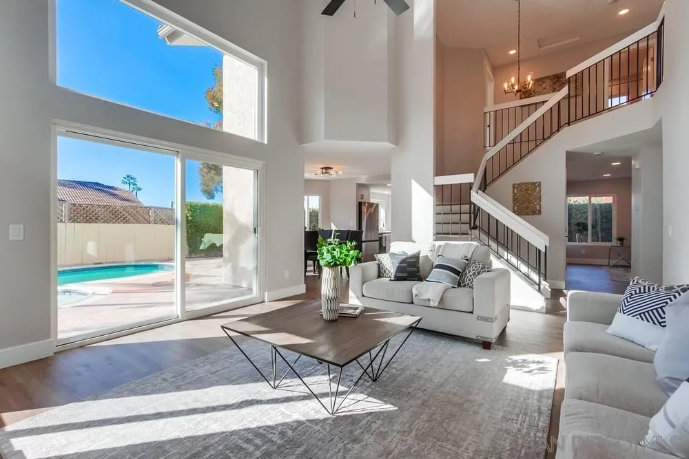 1278 Avenida Miguel Encinitas, CA 92024 - Photo 2 of 47 a living room with furniture and a potted plant