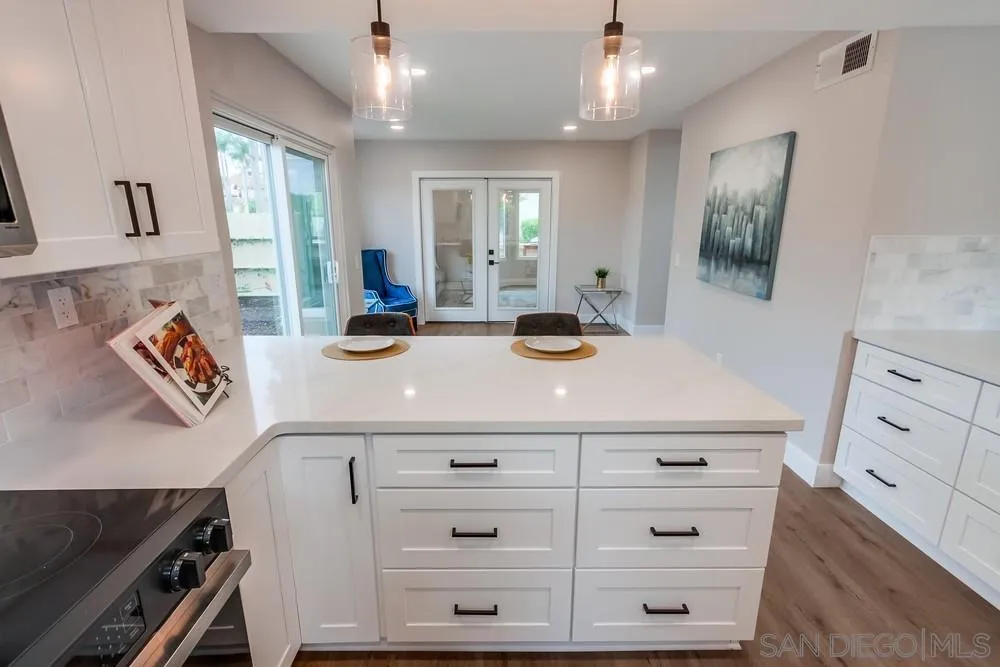 1278 Avenida Miguel Encinitas, CA 92024 - Photo 22 of 47 a kitchen with cabinets and window