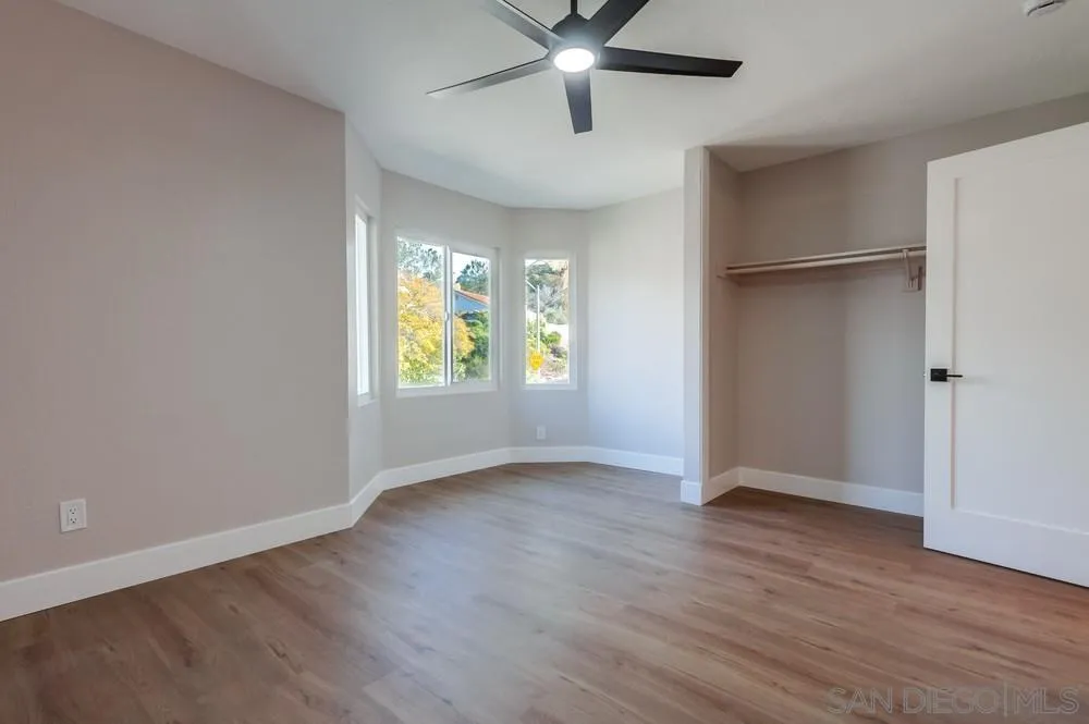 1278 Avenida Miguel Encinitas, CA 92024 - Photo 42 of 47 an empty room with wooden floor closet and windows