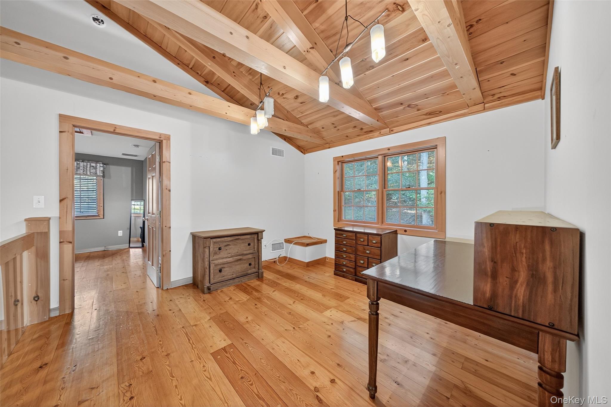 165 Cascade Road Warwick, NY 10990 - Photo 35 of 49 a bedroom with furniture and wooden floor