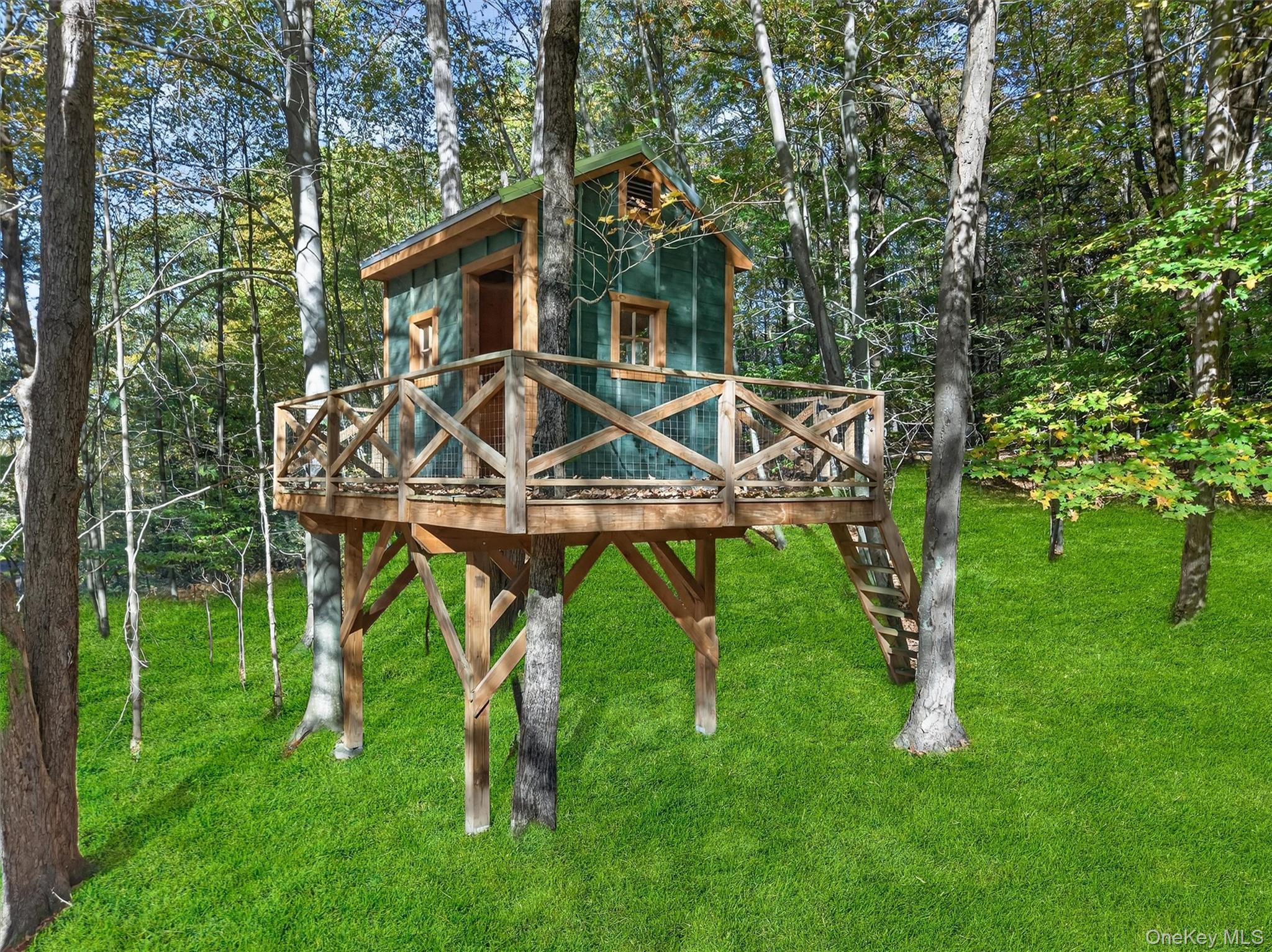 165 Cascade Road Warwick, NY 10990 - Photo 42 of 49 a front view of a house with garden and trees