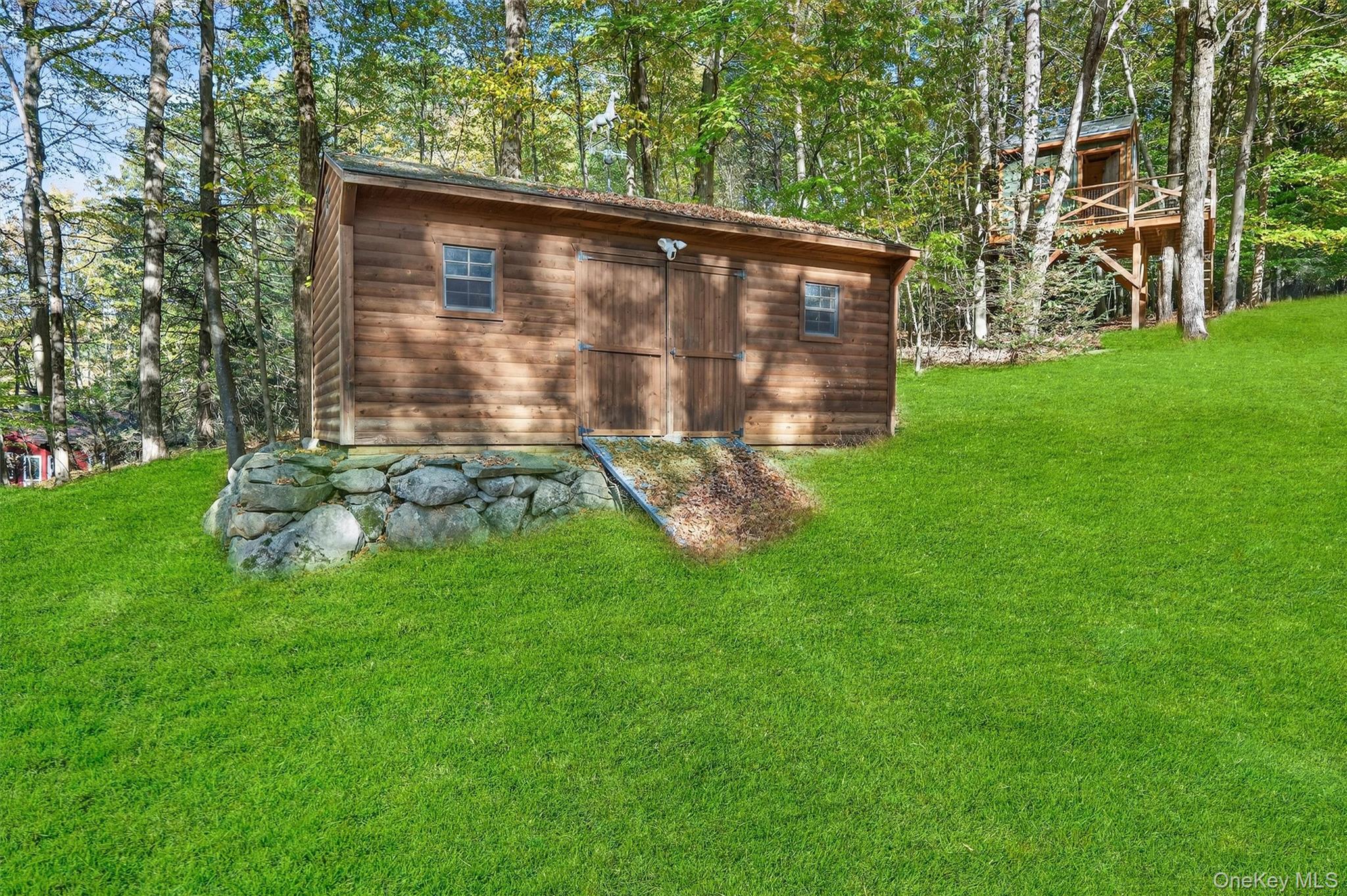 165 Cascade Road Warwick, NY 10990 - Photo 44 of 49 a backyard of a house with lots of green space