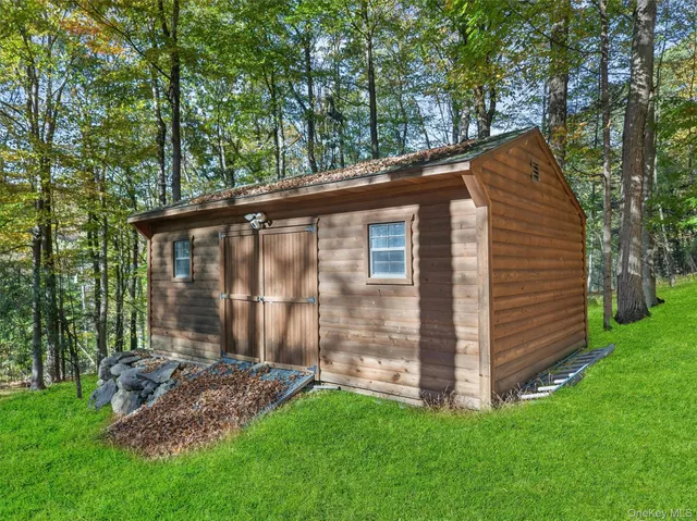 a view of a back yard of the house