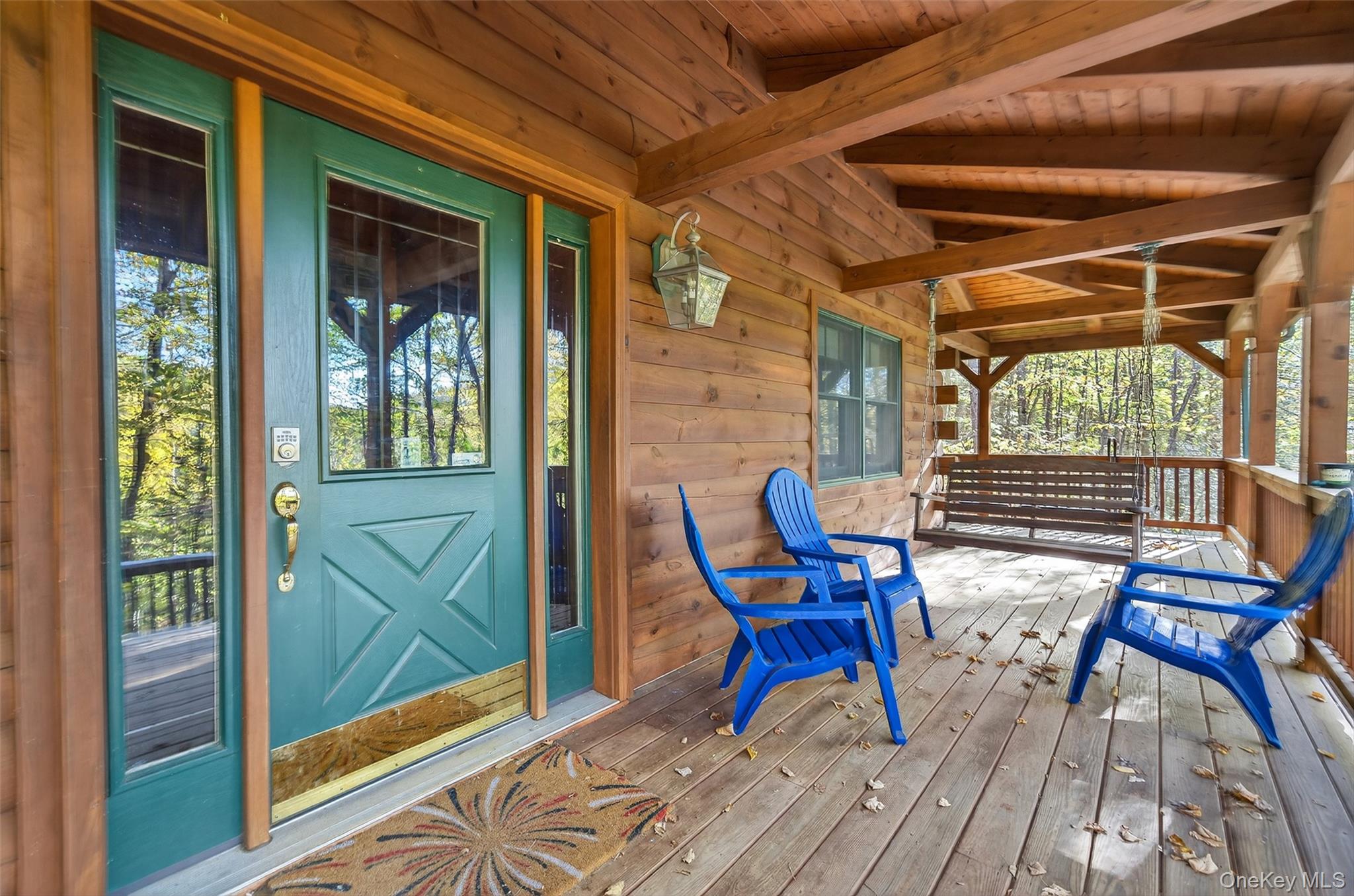 165 Cascade Road Warwick, NY 10990 - Photo 6 of 49 a view of chairs and table in a wooden door