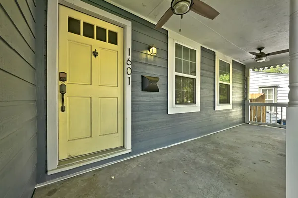 a front view of a house with a glass door