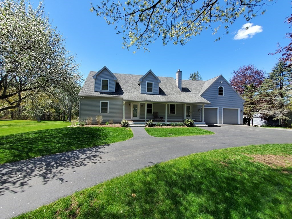 12 Beaman Road Sterling, MA 01564 - Photo 1 of 40 a front view of house with yard and green space