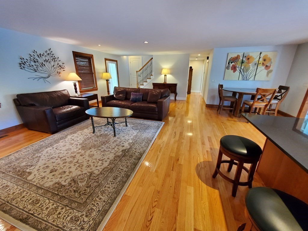 12 Beaman Road Sterling, MA 01564 - Photo 18 of 40 a living room with furniture and a flat screen tv