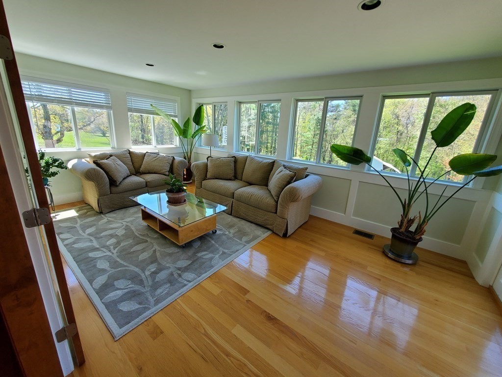 12 Beaman Road Sterling, MA 01564 - Photo 20 of 40 a living room with furniture and a large window