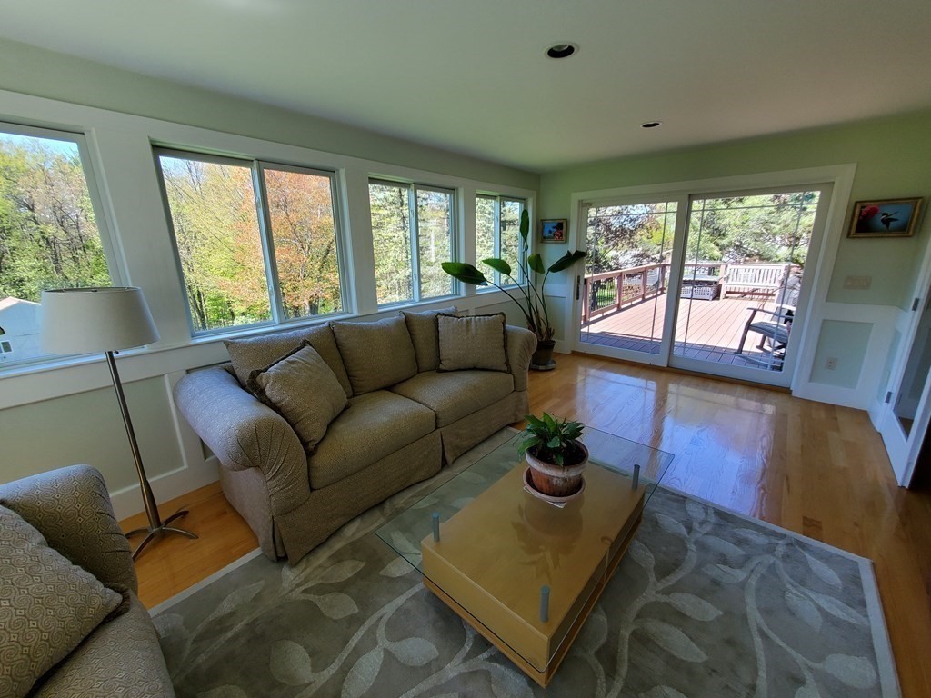 12 Beaman Road Sterling, MA 01564 - Photo 21 of 40 a living room with furniture and a large window