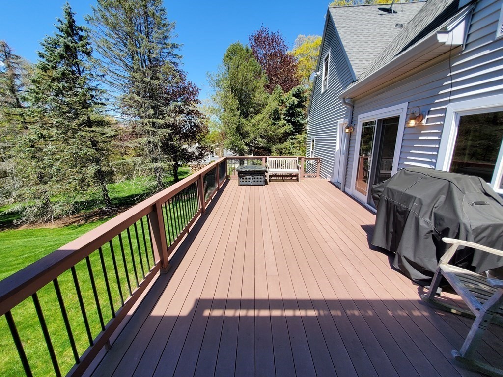 12 Beaman Road Sterling, MA 01564 - Photo 22 of 40 a view of balcony with wooden floor and seating space