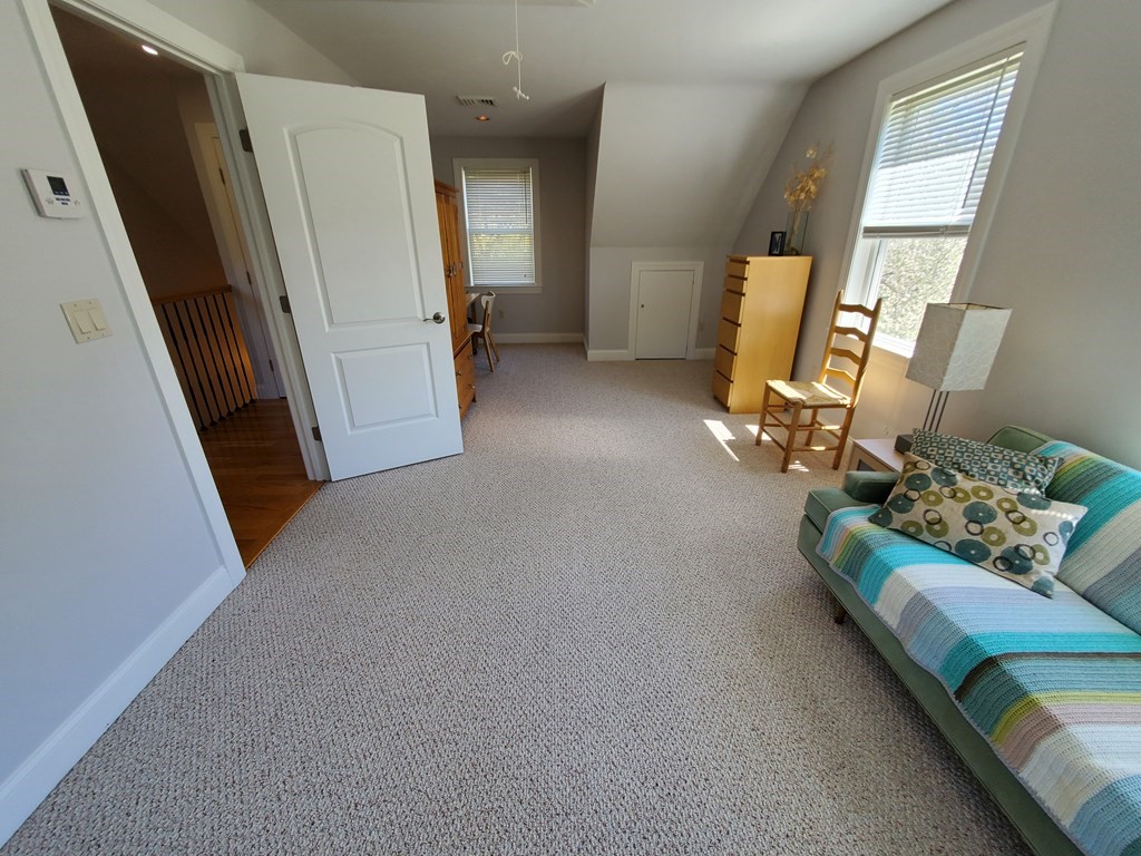 12 Beaman Road Sterling, MA 01564 - Photo 28 of 40 a living room with furniture and a window