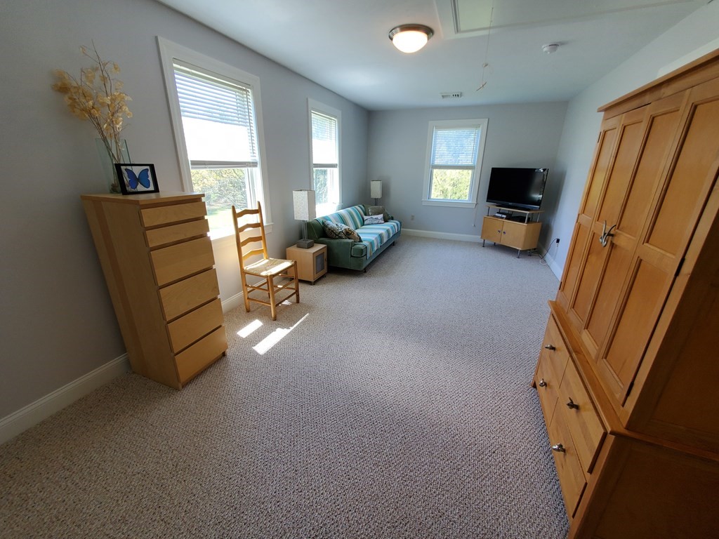12 Beaman Road Sterling, MA 01564 - Photo 29 of 40 a view of a livingroom with furniture and a window