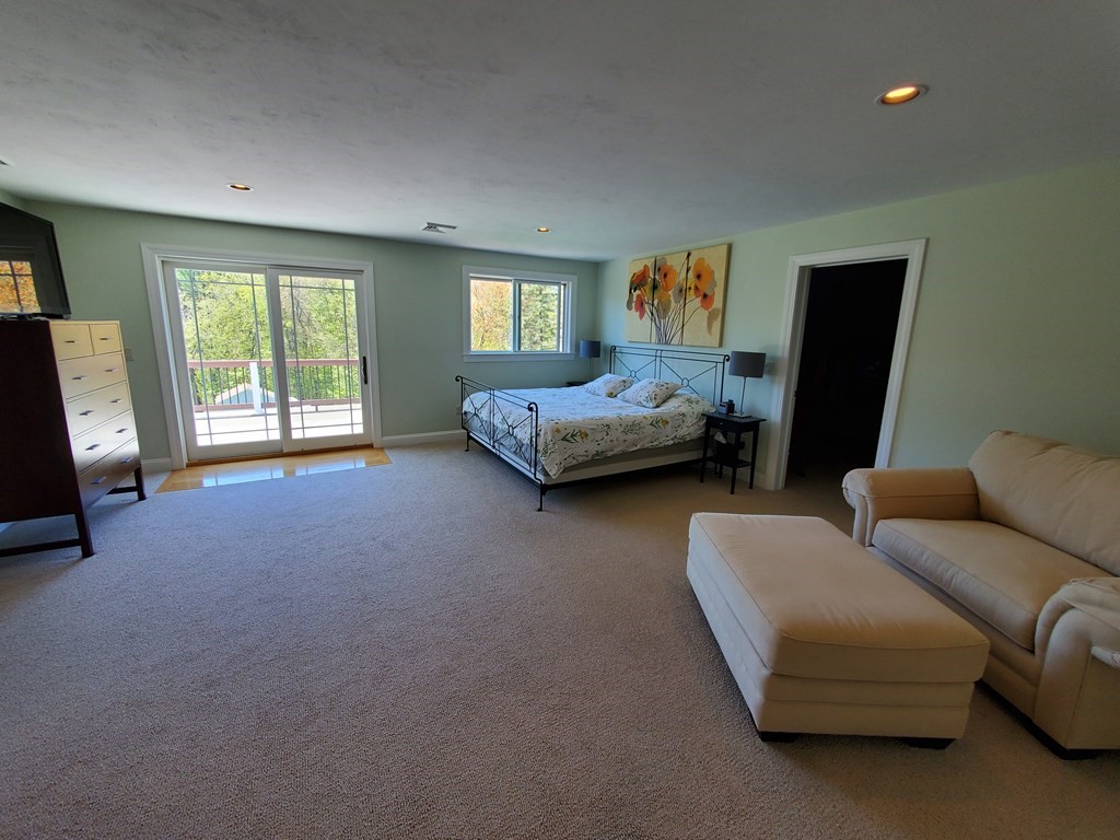 12 Beaman Road Sterling, MA 01564 - Photo 32 of 40 a living room with furniture and a window
