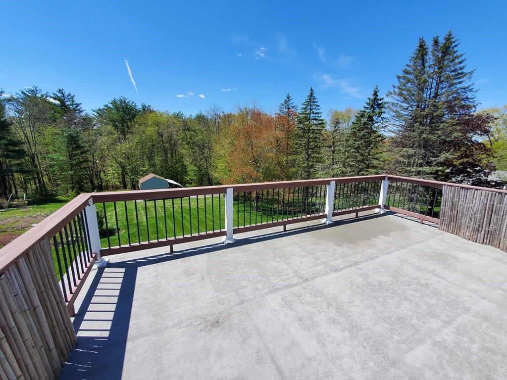 12 Beaman Road Sterling, MA 01564 - Photo 36 of 40 a view of a balcony with trees