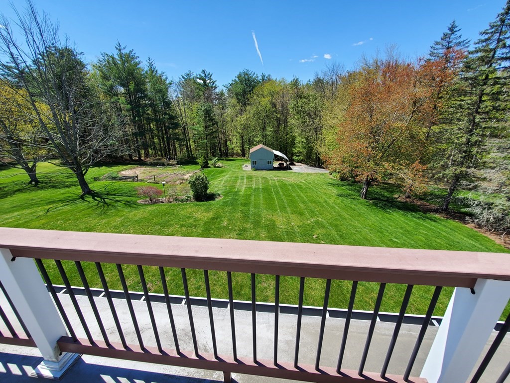 12 Beaman Road Sterling, MA 01564 - Photo 37 of 40 a view of a street with a yard