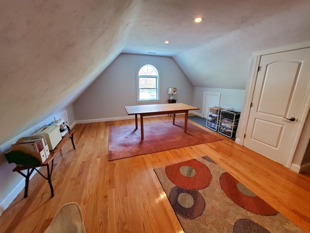 12 Beaman Road Sterling, MA 01564 - Photo 38 of 40 a living room with furniture and a wooden floor