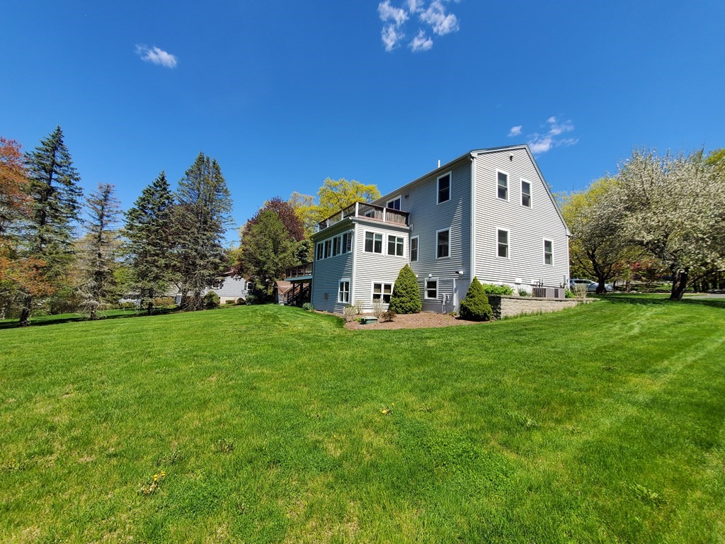 12 Beaman Road Sterling, MA 01564 - Photo 6 of 40 a front view of house with garden