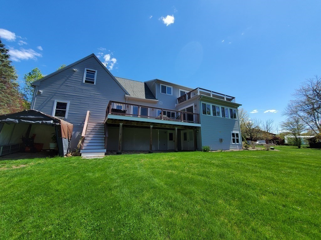 12 Beaman Road Sterling, MA 01564 - Photo 9 of 40 a house view with a garden space