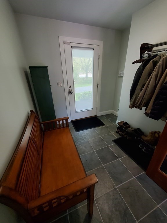 12 Beaman Road Sterling, MA 01564 - Photo 10 of 40 a room with gym equipment and a mirror