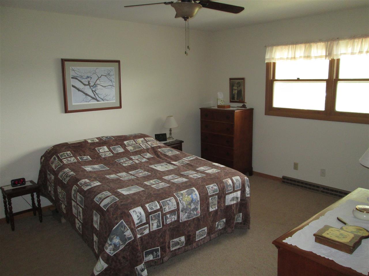 10217 Yale Bridge Road Rockton, IL 61072 - Photo 12 of 25 a bedroom with a bed and a window