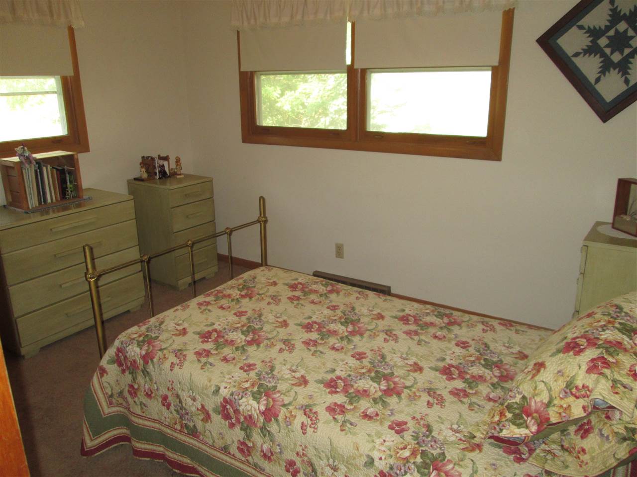 10217 Yale Bridge Road Rockton, IL 61072 - Photo 17 of 25 a bedroom with a bed and a window